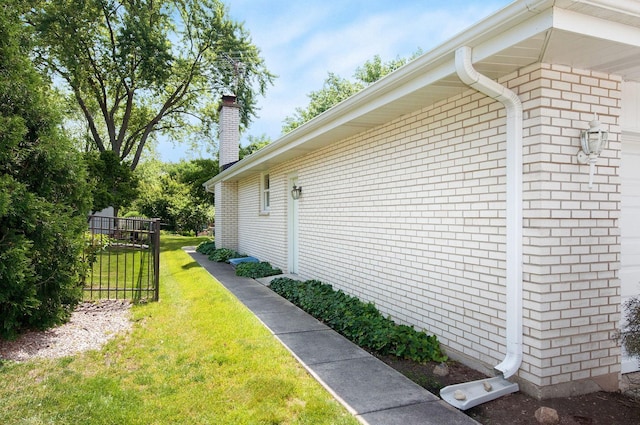 2811 N Harvard Ave, Arlington Heights, IL 60004 - view of property exterior featuring a chimney and brick siding