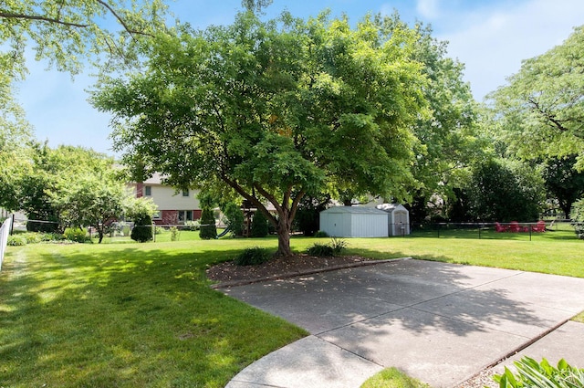 2811 N Harvard Ave, Arlington Heights, IL 60004 - view of yard with a storage unit and a patio area