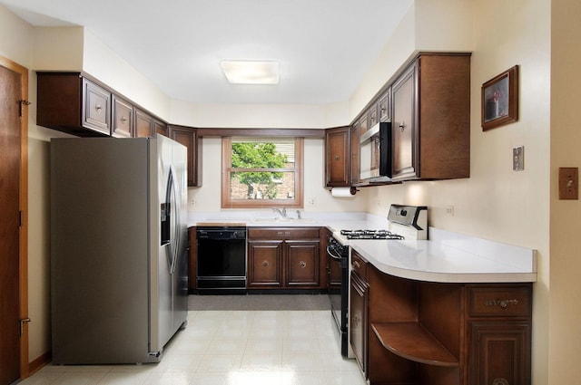 2811 N Harvard Ave, Arlington Heights, IL 60004 - kitchen featuring black appliances, light floors, dark brown cabinets, and light countertops