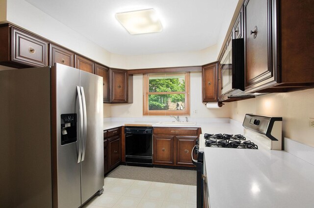 2811 N Harvard Ave, Arlington Heights, IL 60004 - kitchen with appliances with stainless steel finishes, light countertops, and light flooring