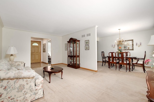 2811 N Harvard Ave, Arlington Heights, IL 60004 - carpeted living area featuring ornamental molding and a chandelier