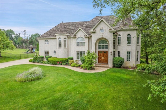 14695 Fox Hollow Ln, Lemont, IL 60439 - french country inspired facade with a playground