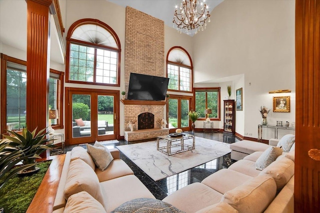 14695 Fox Hollow Ln, Lemont, IL 60439 - living room featuring a high ceiling, plenty of natural light, a chandelier, wood finished floors, and a fireplace