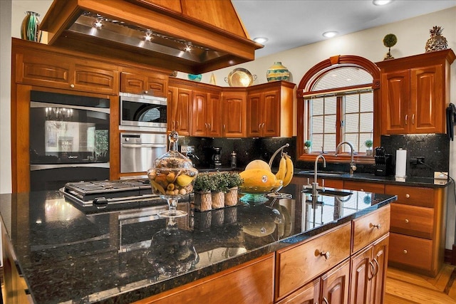 14695 Fox Hollow Ln, Lemont, IL 60439 - kitchen with stainless steel microwave, custom range hood, tasteful backsplash, double oven, and dark stone counters