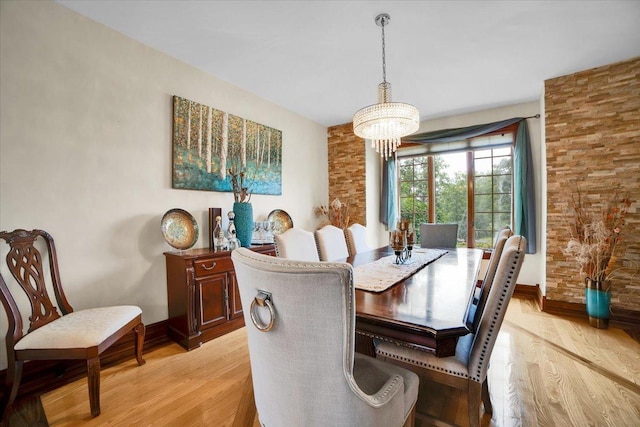 14695 Fox Hollow Ln, Lemont, IL 60439 - dining area featuring a chandelier and light wood finished floors
