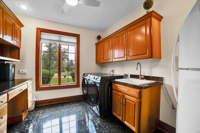 14695 Fox Hollow Ln, Lemont, IL 60439 - laundry area with independent washer and dryer, a ceiling fan, granite tiled floors, and cabinet space