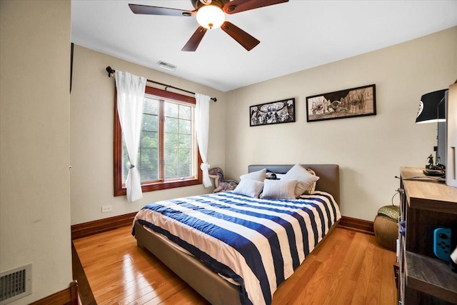 14695 Fox Hollow Ln, Lemont, IL 60439 - bedroom with wood finished floors and ceiling fan