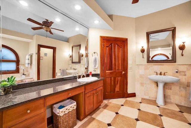 14695 Fox Hollow Ln, Lemont, IL 60439 - bathroom featuring ceiling fan, tile walls, recessed lighting, tile patterned floors, and wainscoting