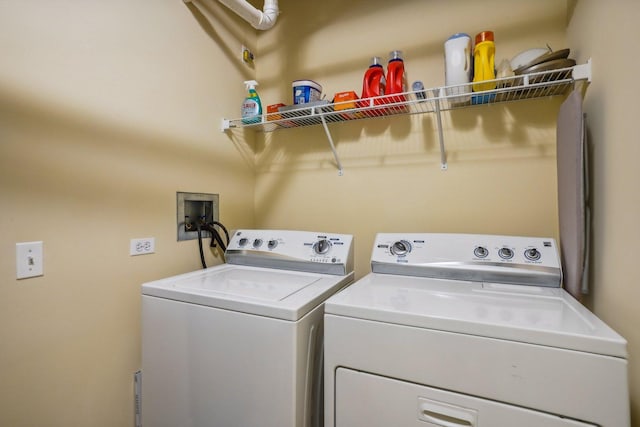 1159 N Hudson St Unit 1-101, Chicago, IL 60610 - laundry room featuring washing machine and dryer