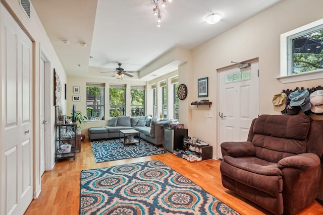1159 N Hudson St Unit 1-101, Chicago, IL 60610 - living room featuring plenty of natural light, light wood-style flooring, and ceiling fan