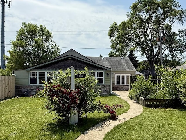 2705 W 98th St, Evergreen Park, IL 60805 - back of house with stone siding and a shingled roof
