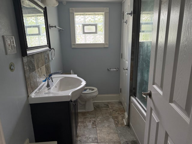 2705 W 98th St, Evergreen Park, IL 60805 - bathroom featuring vanity and stone finish flooring