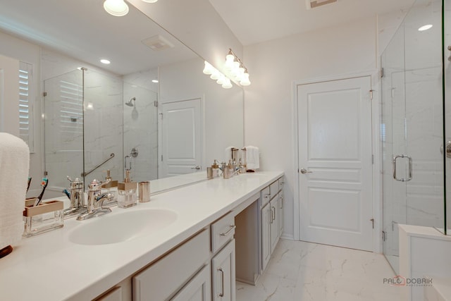3181 Rockwell Cir, Mundelein, IL 60060 - bathroom with double vanity, a marble finish shower, marble finish flooring, and recessed lighting
