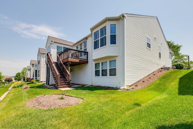 3181 Rockwell Cir, Mundelein, IL 60060 - back of house with a wooden deck, stairway, and a lawn