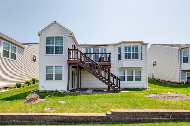 3181 Rockwell Cir, Mundelein, IL 60060 - rear view of property with stairway, a deck, and a yard