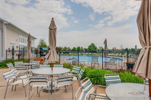 3181 Rockwell Cir, Mundelein, IL 60060 - view of patio / terrace featuring outdoor dining space and a community pool