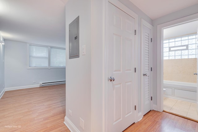 2624 W Catalpa Ave Unit 14, Chicago, IL 60625 - corridor with electric panel, light wood-style flooring, and baseboard heating