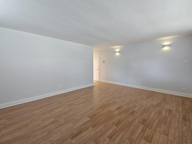 2624 W Catalpa Ave Unit 14, Chicago, IL 60625 - empty room featuring wood finished floors