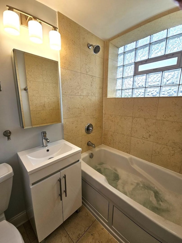 2624 W Catalpa Ave Unit 14, Chicago, IL 60625 - bathroom featuring vanity, tub / shower combination, and tile patterned floors