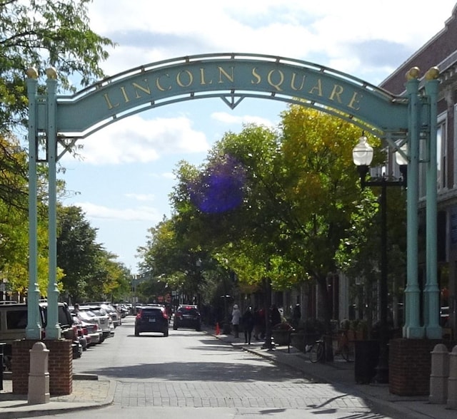 2624 W Catalpa Ave Unit 14, Chicago, IL 60625 - view of asphalt road featuring street lighting, sidewalks, and curbs