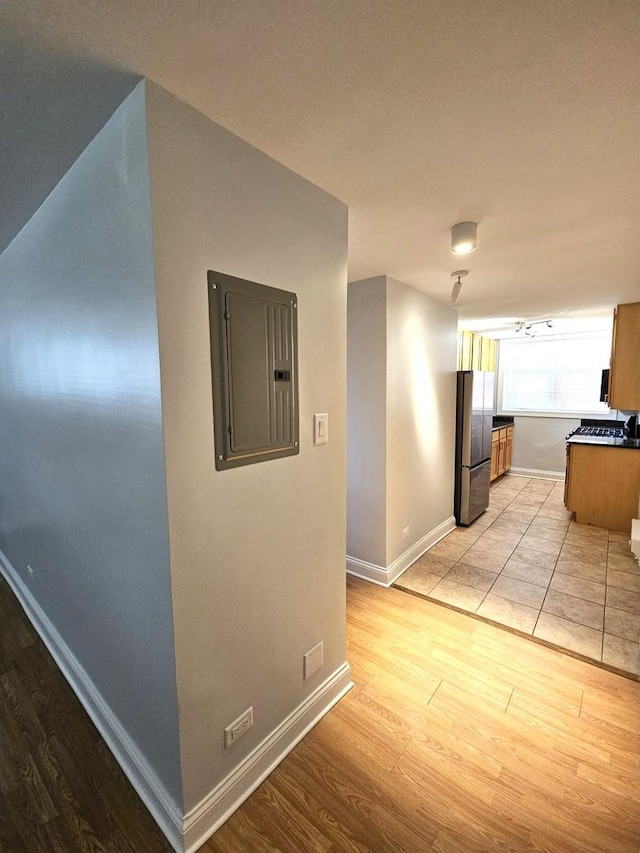 2624 W Catalpa Ave Unit 14, Chicago, IL 60625 - corridor featuring electric panel and light wood-style flooring