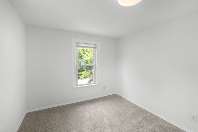 3225 Gilead Ave, Zion, IL 60099 - spare room featuring baseboards and carpet flooring
