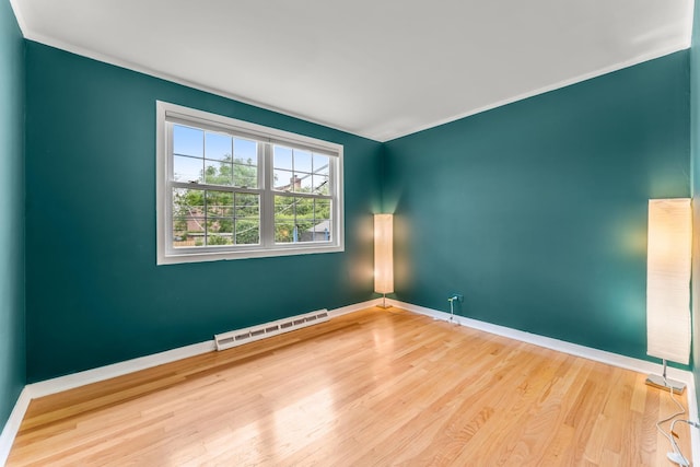 7446 Lake St, Morton Grove, IL 60053 - spare room with wood finished floors and crown molding