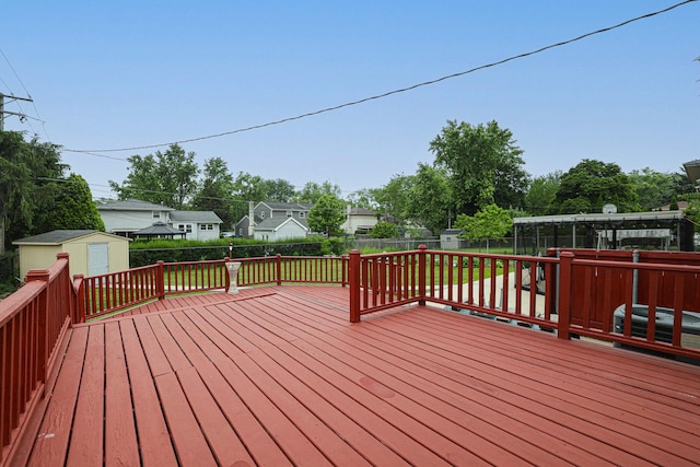 1831 E Camp Mcdonald Rd Unit 0, Mount Prospect, IL 60056 - deck with a storage shed and a fenced backyard