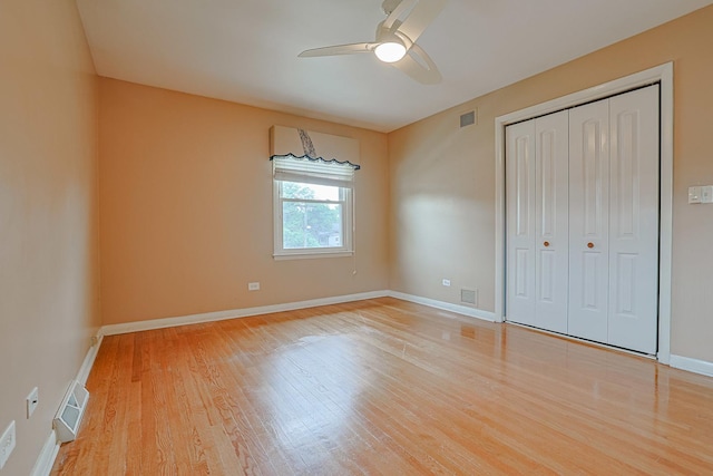 1831 E Camp Mcdonald Rd Unit 0, Mount Prospect, IL 60056 - unfurnished bedroom featuring light wood-type flooring, a closet, and a ceiling fan