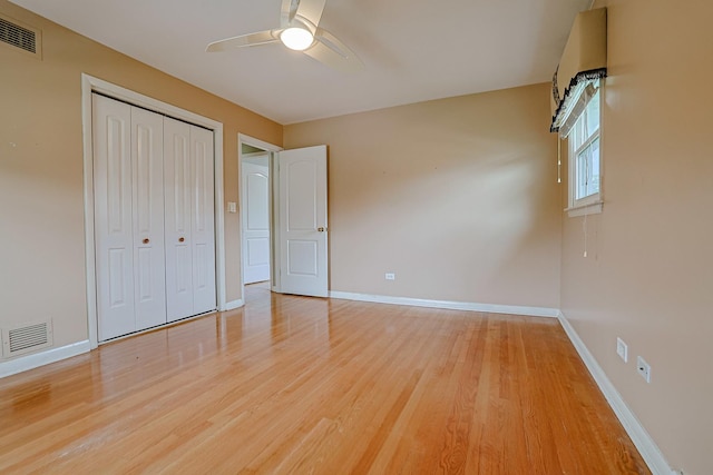 1831 E Camp Mcdonald Rd Unit 0, Mount Prospect, IL 60056 - unfurnished bedroom with light wood-style flooring, a closet, and ceiling fan