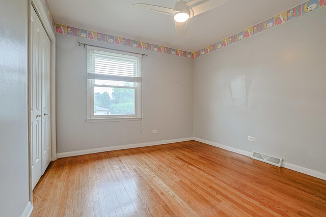 1831 E Camp Mcdonald Rd Unit 0, Mount Prospect, IL 60056 - empty room with light wood-style floors and a ceiling fan