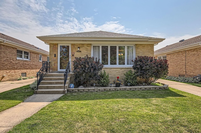 4453 N Canfield Ave, Norridge, IL 60706 - view of front of property featuring brick siding and a front lawn