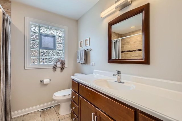 4453 N Canfield Ave, Norridge, IL 60706 - full bathroom featuring vanity, a shower with curtain, and tile patterned floors