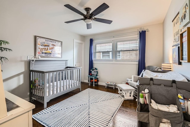 4453 N Canfield Ave, Norridge, IL 60706 - bedroom with a nursery area, dark wood finished floors, and a ceiling fan