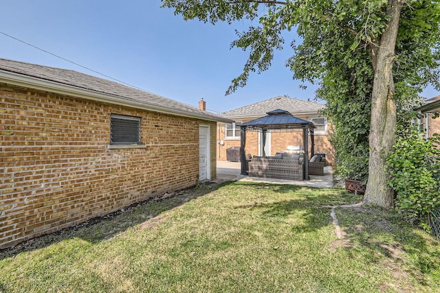 4453 N Canfield Ave, Norridge, IL 60706 - view of grassy yard with a gazebo, a patio area, and an outdoor hangout area