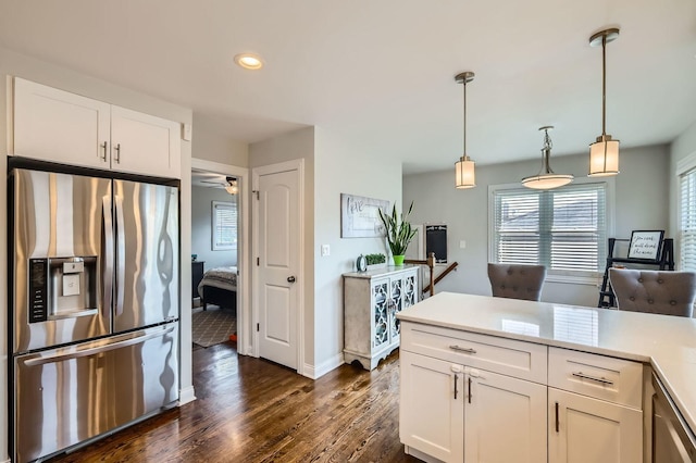 4453 N Canfield Ave, Norridge, IL 60706 - kitchen with stainless steel fridge with ice dispenser, dark wood-style flooring, white cabinets, plenty of natural light, and recessed lighting
