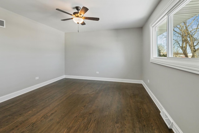 15245 Narcissus Ct, Orland Park, IL 60462 - spare room with a ceiling fan and dark wood-style floors