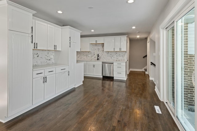 15245 Narcissus Ct, Orland Park, IL 60462 - kitchen featuring stainless steel dishwasher, plenty of natural light, tasteful backsplash, light countertops, and recessed lighting