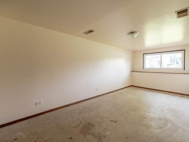 2134 S Hull Dr, Wheaton, IL 60189 - empty room featuring baseboards and unfinished concrete flooring
