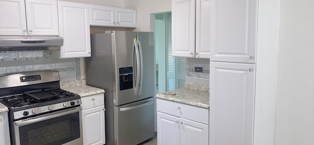 396 Thelma Ct, Wheeling, IL 60090 - kitchen with appliances with stainless steel finishes, backsplash, under cabinet range hood, and white cabinetry