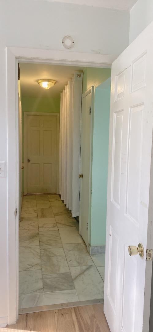 396 Thelma Ct, Wheeling, IL 60090 - hallway featuring light marble finish flooring