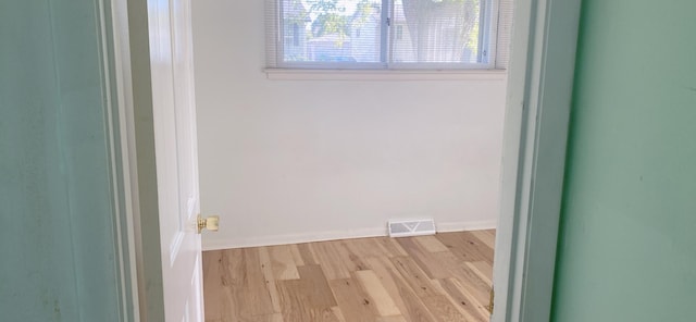 396 Thelma Ct, Wheeling, IL 60090 - unfurnished room featuring wood finished floors and baseboards