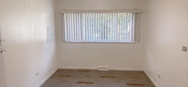 396 Thelma Ct, Wheeling, IL 60090 - empty room with wood finished floors and baseboards