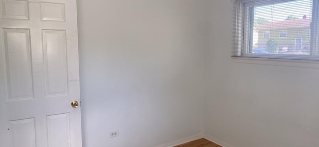 396 Thelma Ct, Wheeling, IL 60090 - unfurnished room featuring baseboards and wood finished floors
