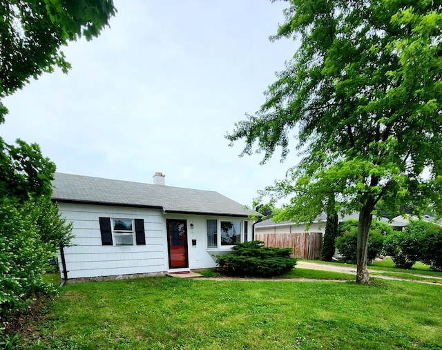 1011 E Taylor St, Dekalb, IL 60115 - single story home featuring a chimney