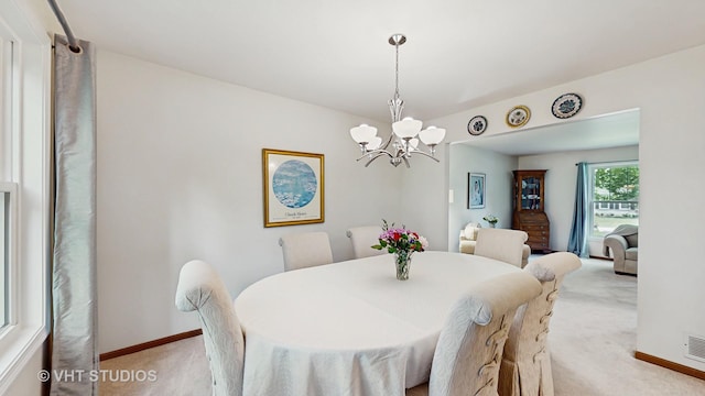 2478 Lawson Blvd, Gurnee, IL 60031 - dining space featuring light colored carpet and a chandelier