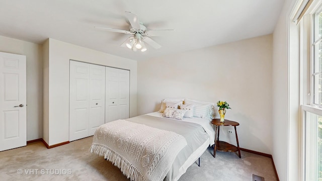 2478 Lawson Blvd, Gurnee, IL 60031 - bedroom with light colored carpet, a closet, and a ceiling fan