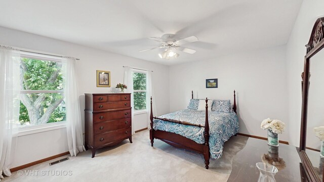 2478 Lawson Blvd, Gurnee, IL 60031 - carpeted bedroom with a ceiling fan and baseboards