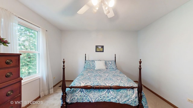2478 Lawson Blvd, Gurnee, IL 60031 - bedroom with light colored carpet and a ceiling fan