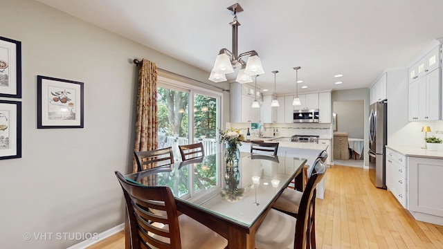 2478 Lawson Blvd, Gurnee, IL 60031 - dining area with a chandelier, light wood-type flooring, and recessed lighting
